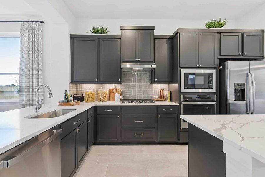Furnished interior view inside a new home in Sunterra, Katy (Image 16).