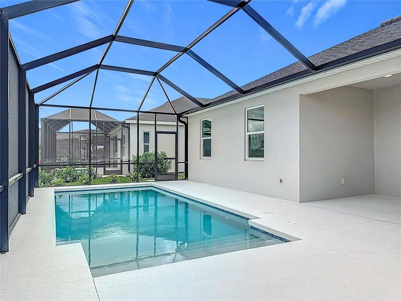 Exterior details and patio area of a home in , Parrish (Image 23).