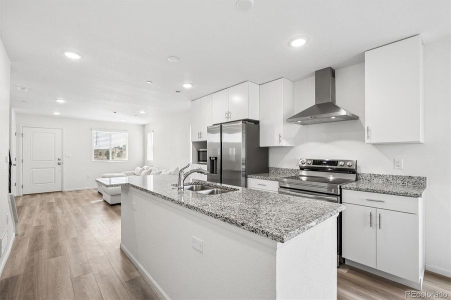 Furnished interior view inside a new home in Reunion, Commerce City (Image 8).