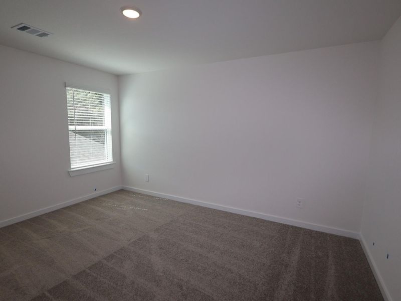 Spacious, unfurnished interior of a new home in Sorella, Tomball (Image 36).