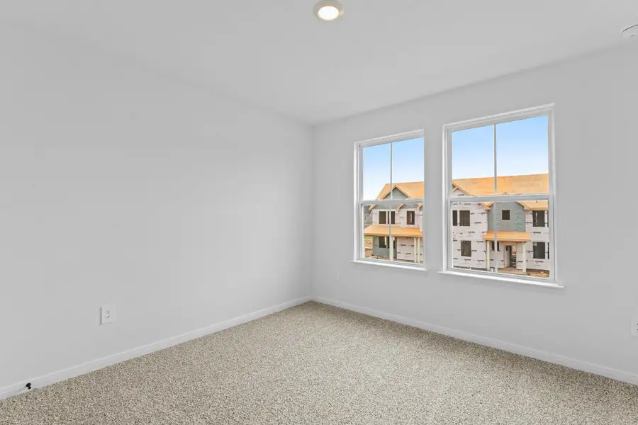 Spacious, unfurnished interior of a new home in Avery Centre, Round Rock (Image 22).