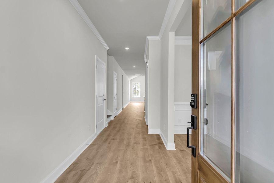 Spacious, unfurnished interior of a new home in Tidewater at Lakes of Cane Bay, Summerville (Image 33).