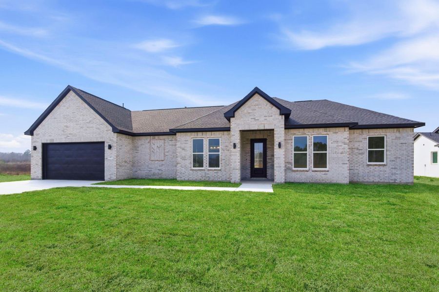 Front exterior of a new home in , Dayton, TX, highlighting curb appeal (Image 30).