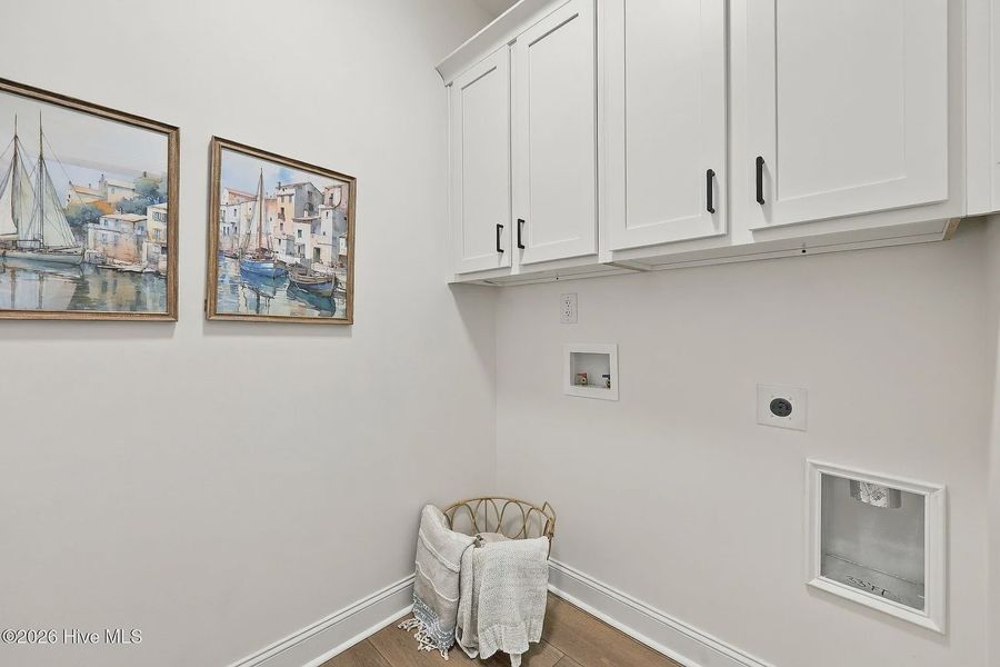 Furnished interior view inside a new home in Dixon Grove, Grimesland (Image 7).