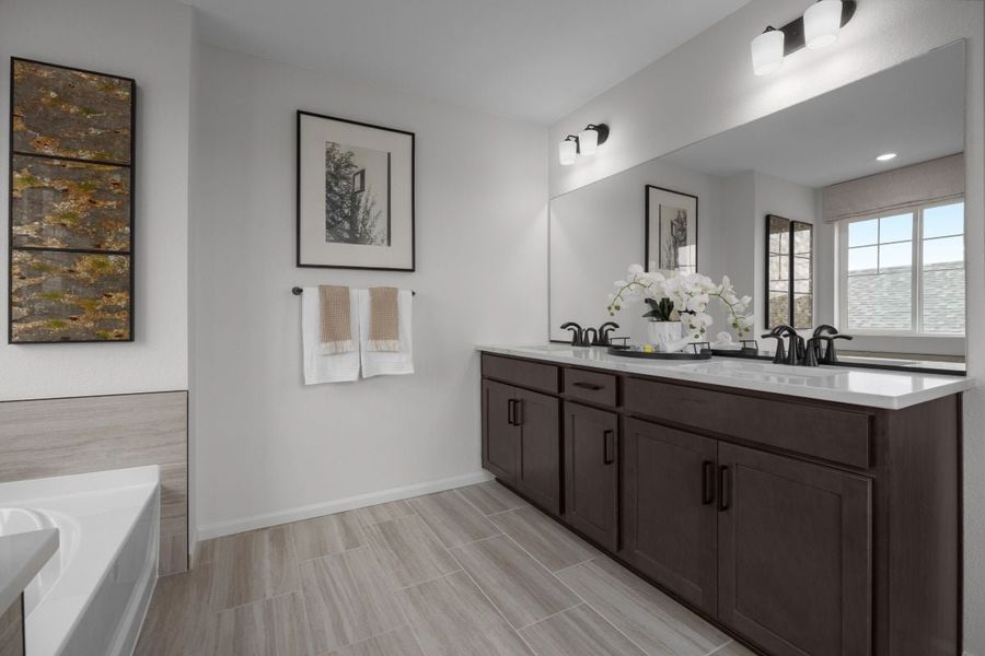 Dual-sink vanity at primary bath