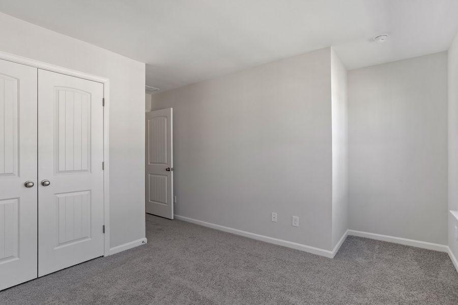 Spacious, unfurnished interior of a new home in Renaissance at White Oak, Garner (Image 32).