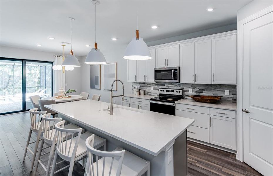 Furnished interior view inside a new home in The Strand at Cedar Grove, North Port (Image 25). Furnished interior view inside a new home in The Strand at Cedar Grove, North Port (Image 25).