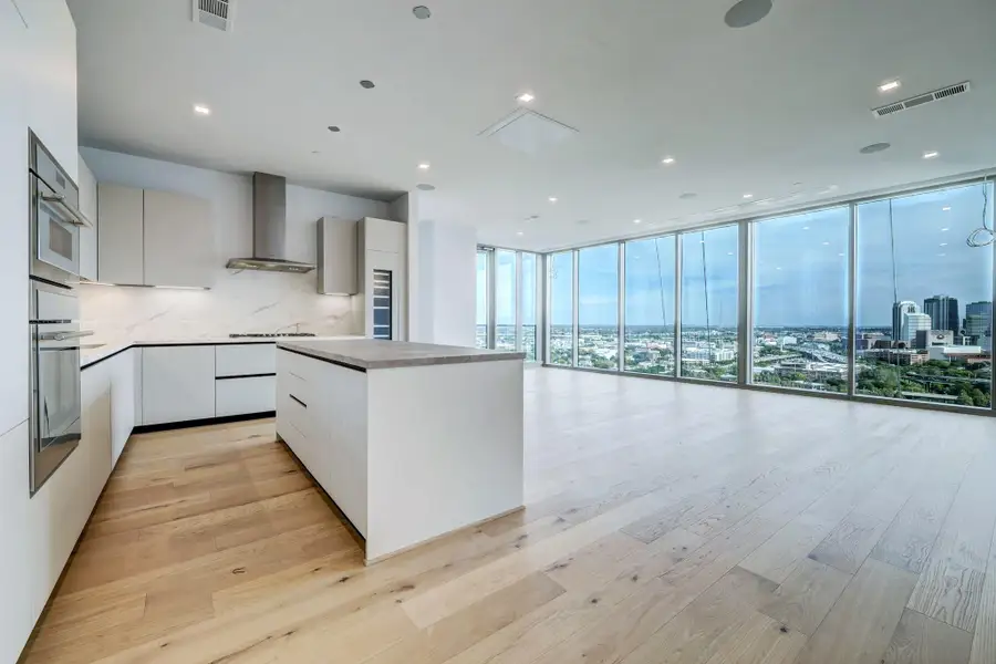 Kitchen features Pedini Italian cabinets, porcelain back splashes and counter tops. Plus, Thermador appliances and separate wine refrigerator. Kitchen features Pedini Italian cabinets, porcelain back splashes and counter tops. Plus, Thermador appliances and separate wine refrigerator.