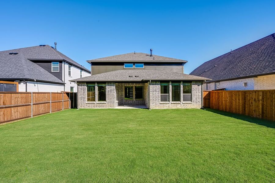 Exterior details and patio area of a home in South Oak 50s, Oak Point (Image 3). Exterior details and patio area of a home in South Oak 50s, Oak Point (Image 3).