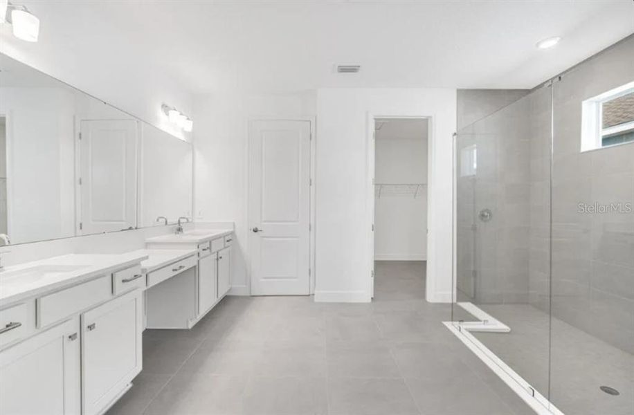 Furnished interior view inside a new home in Harvest at Ovation, Winter Garden (Image 5).