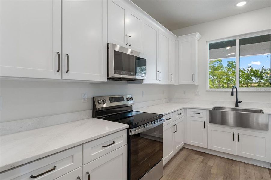 Furnished interior view inside a new home in , Weeki Wachee (Image 8).
