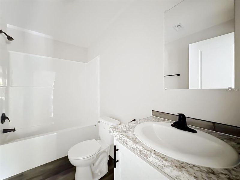 Furnished interior view inside a new home in , Orlando (Image 9).