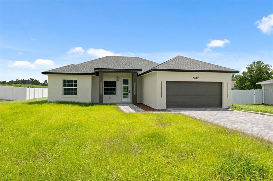 Front exterior of a new home in , Ocala, FL, highlighting curb appeal (Image 20). Front exterior of a new home in , Ocala, FL, highlighting curb appeal (Image 20).