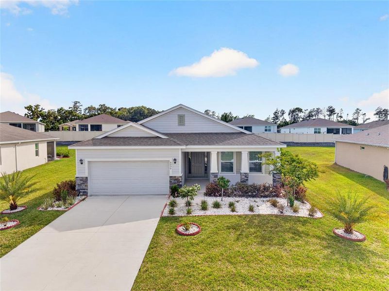 Front exterior of a new home in , Ocala, FL, highlighting curb appeal (Image 27).