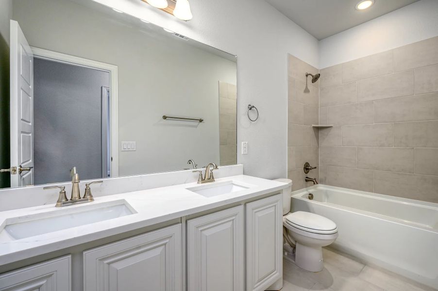 Representative furnished interior of a home built from the Portico by Stonehollow Homes in Heritage Grove, Blue Ridge (Image 10).
