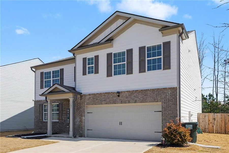 Front exterior of a new home in , Dallas, GA, highlighting curb appeal (Image 30). Front exterior of a new home in , Dallas, GA, highlighting curb appeal (Image 30).