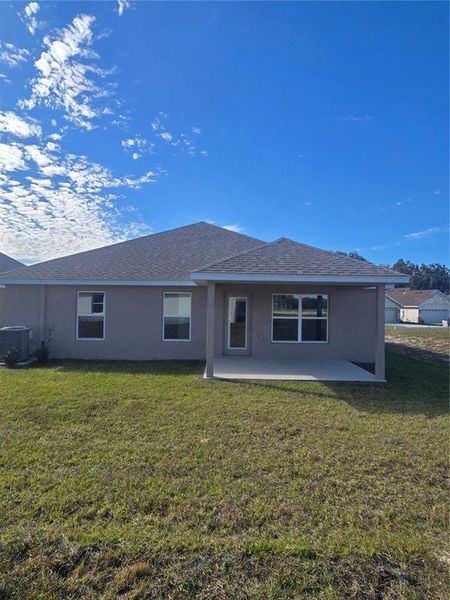 Exterior details and patio area of a home in Wyld Palms, Inverness (Image 17).