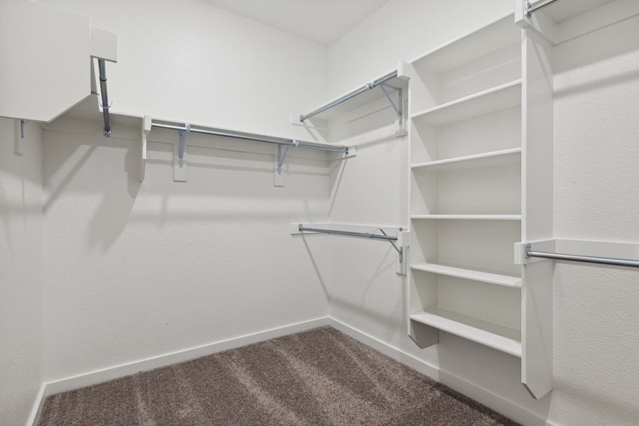 Primary Closet in the Mesquite home plan by Trophy Signature Homes – REPRESENTATIVE PHOTO