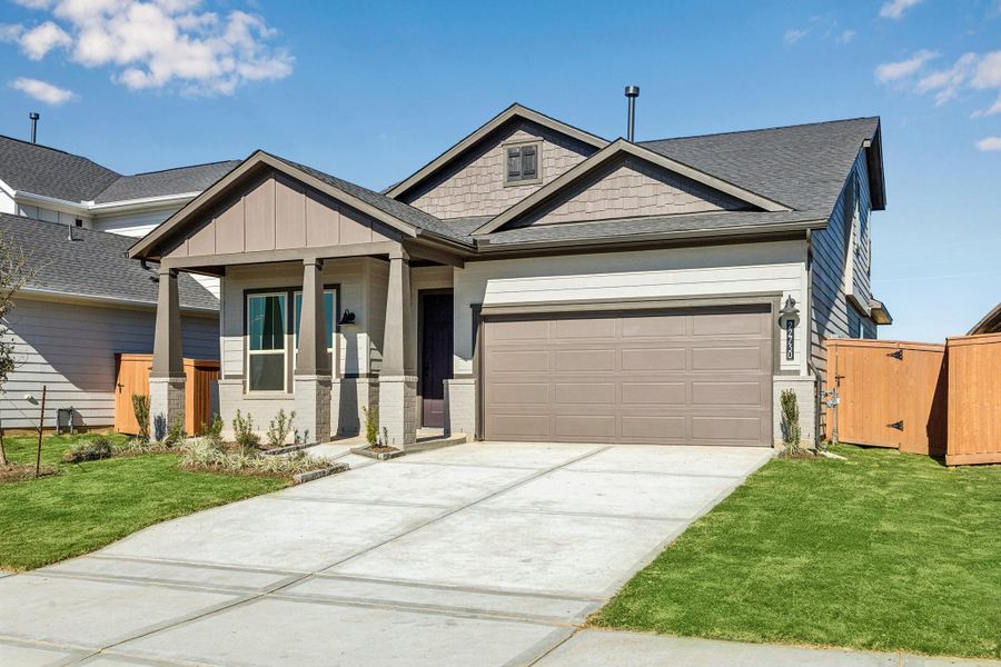 Front exterior of a new home in Elyson, Katy, TX, highlighting curb appeal (Image 2).