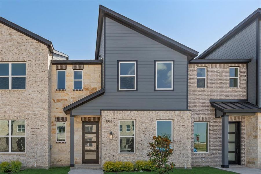 Front exterior of a new home in , Rowlett, TX, highlighting curb appeal (Image 2). Front exterior of a new home in , Rowlett, TX, highlighting curb appeal (Image 2).