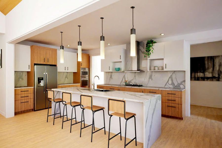 Elegant kitchen has quartz countertops with a waterfall island, custom wood cabinetry, and Thermador appliances. Elegant kitchen has quartz countertops with a waterfall island, custom wood cabinetry, and Thermador appliances.