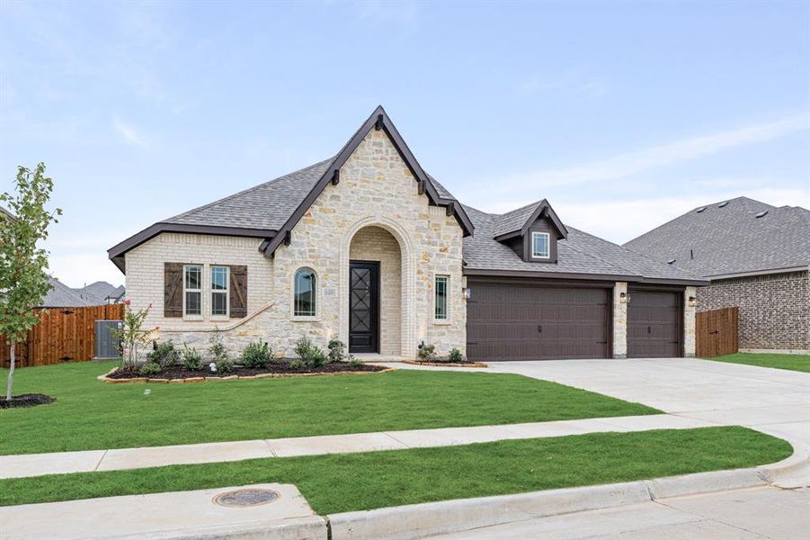 Front exterior of a new home in Hampton Park, Glenn Heights, TX, highlighting curb appeal (Image 23).