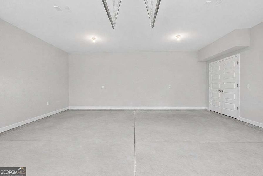 Spacious, unfurnished interior of a new home in The Cottages at East Lanier, Fayetteville (Image 18).