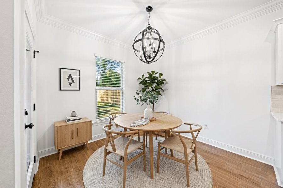 Front exterior of a new home in Sentinel Ridge, Pace, FL, highlighting curb appeal (Image 2).