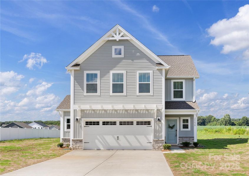 Front exterior of a new home in , New London, NC, highlighting curb appeal (Image 2).