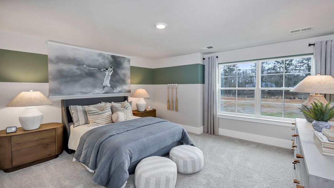 Representative furnished interior of a home built from the Harbor Oak by D.R. Horton in Lake Tide Summit, Chapin (Image 52).