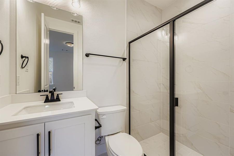 Furnished interior view inside a new home in M3 Ranch 60s, Mansfield (Image 12).