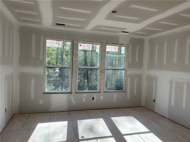 This bright room with multiple windows invites nat