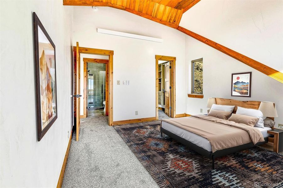 Virtually staged upper level bedroom.