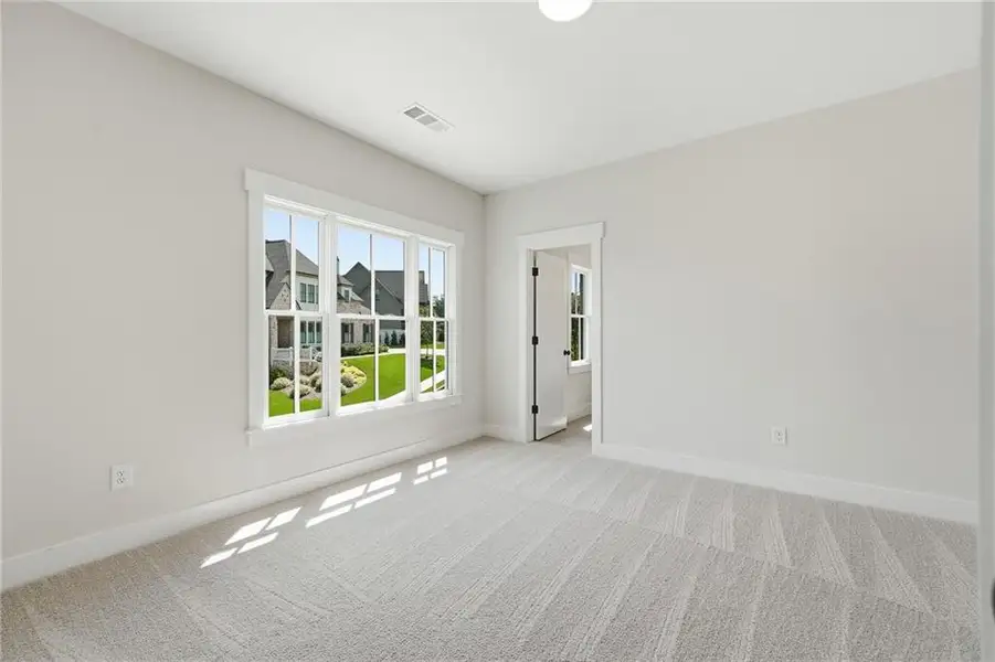Spacious, unfurnished interior of a new home in Malone's Pond, Ball Ground (Image 28).