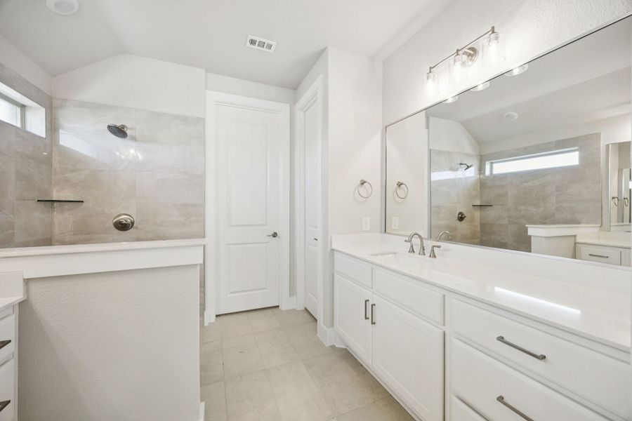 Representative furnished interior of a home built from the Adolphus by Centre Living Homes in Painted Tree Woodland West, McKinney (Image 9).