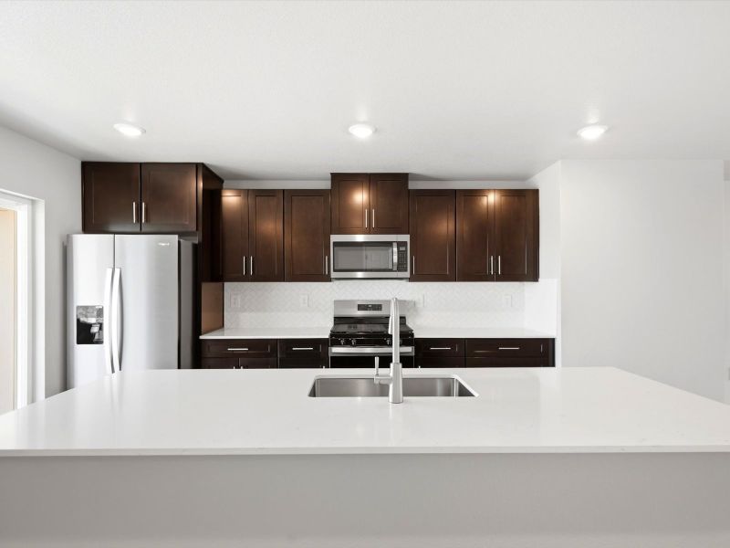 Furnished interior view inside a new home in Three Hills, Morrison (Image 4).
