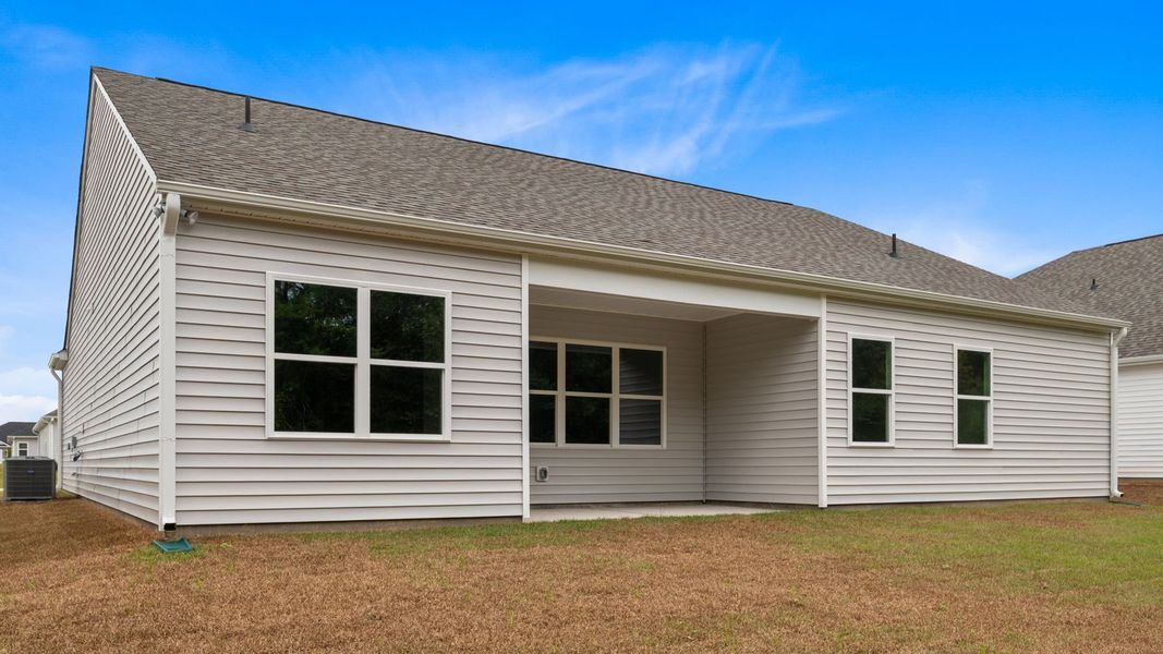 Front exterior of a new home in Villa Grande, Winterville, NC, highlighting curb appeal (Image 19).