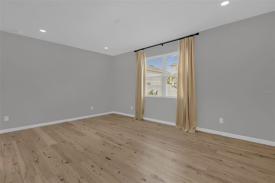 Spacious, unfurnished interior of a new home in Seasons at Lakeside Forest, Tavares (Image 43).