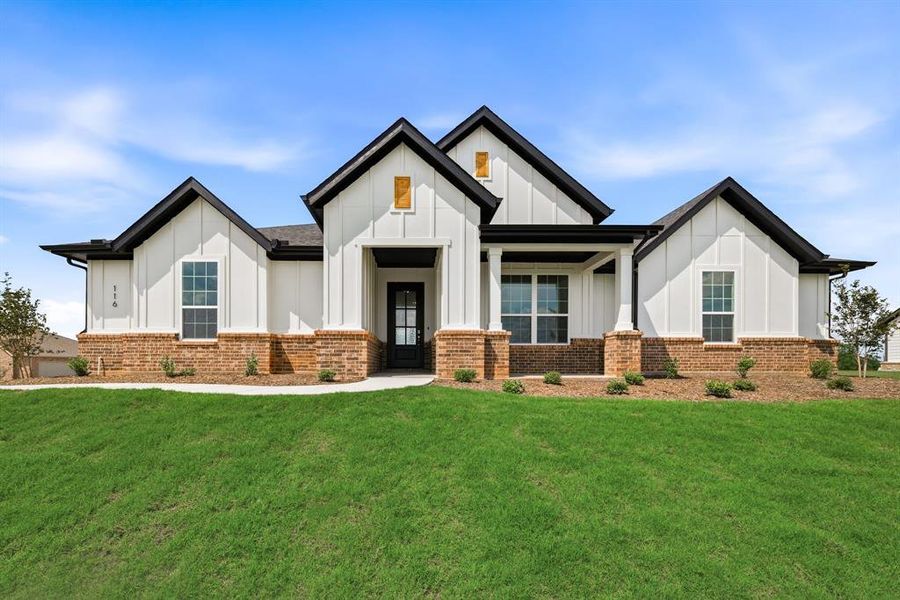 Front exterior of a new home in Saddleback Estates, Boyd, TX, highlighting curb appeal (Image 2). Front exterior of a new home in Saddleback Estates, Boyd, TX, highlighting curb appeal (Image 2).