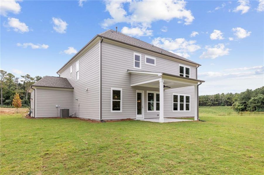 Exterior details and patio area of a home in Ashbury Commons, Powder Springs (Image 30).