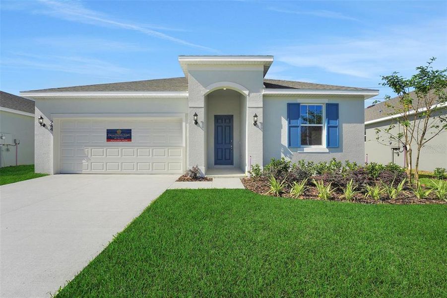 Front exterior of a new home in Willowbrook North, Winter Haven, FL, highlighting curb appeal (Image 2). Front exterior of a new home in Willowbrook North, Winter Haven, FL, highlighting curb appeal (Image 2).