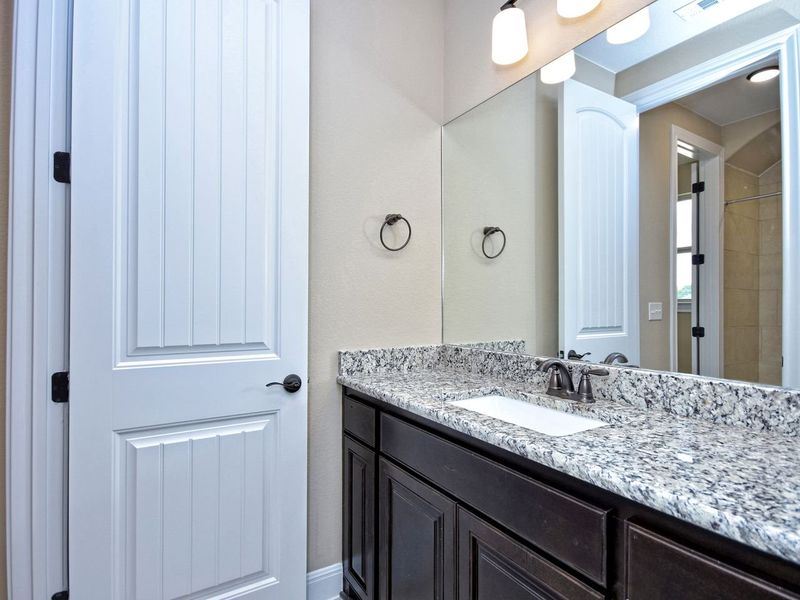 Representative furnished interior of a home built from the Madera II by Giddens Homes in Scofield Farms Estates, Georgetown (Image 227).