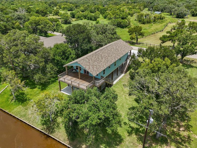 Front exterior of a new home in , Sargent, TX, highlighting curb appeal (Image 2). Front exterior of a new home in , Sargent, TX, highlighting curb appeal (Image 2).