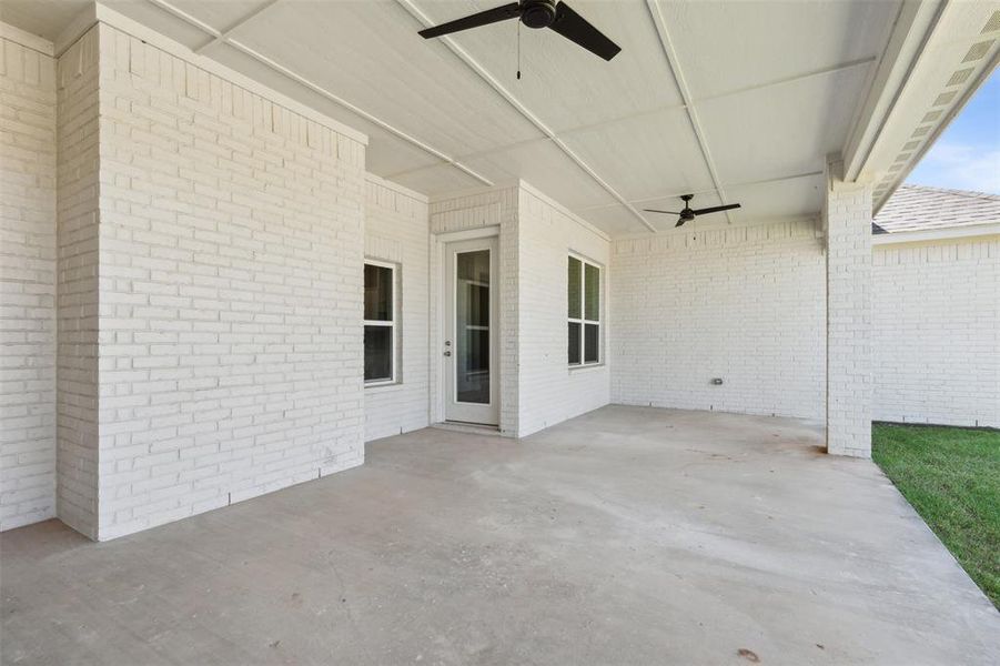 View of patio with ceiling fan