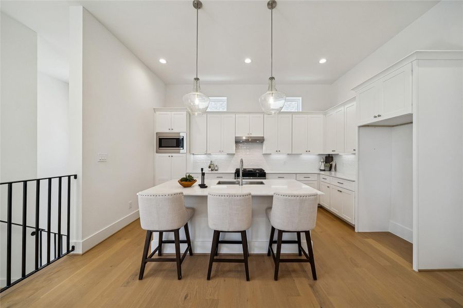 Furnished interior view inside a new home in West 21st Residences, Houston (Image 9).