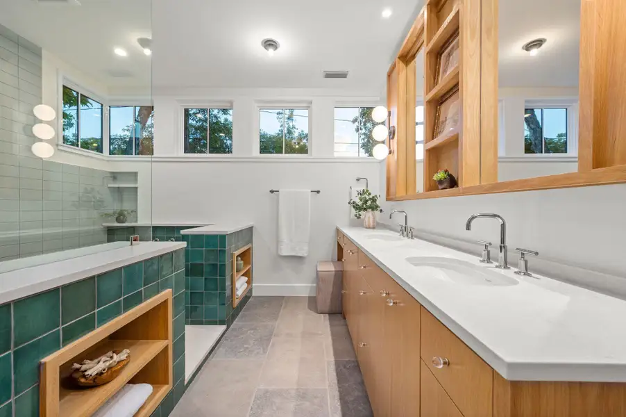 Primary bathroom featuring a double vanity Primary bathroom featuring a double vanity