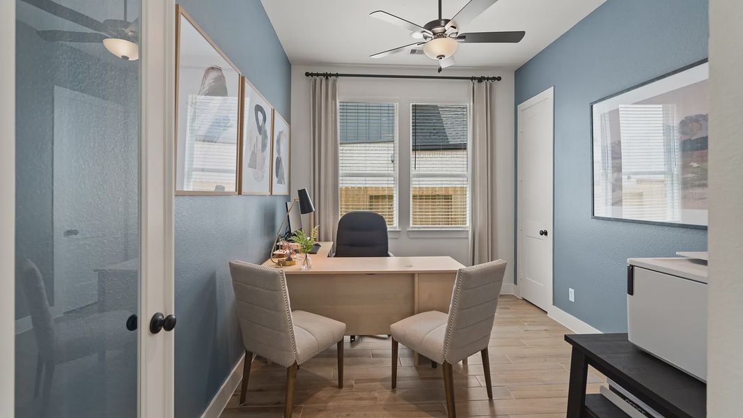Representative furnished interior of a home built from the Hillcrest by Chesmar Homes in Artavia, Conroe (Image 13).