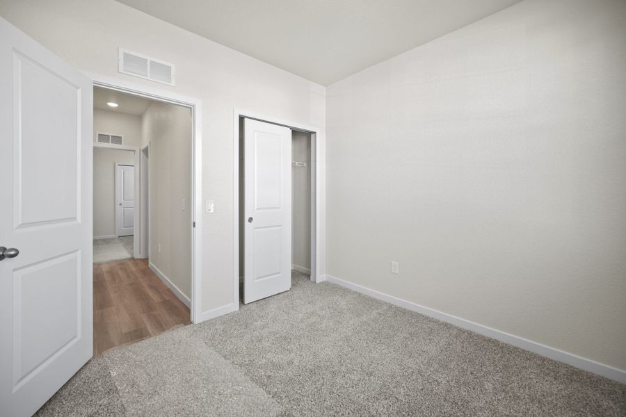 Representative unfurnished interior of a home built from the Juniper by View Homes in Aspen Ranch, Fountain (Image 15).