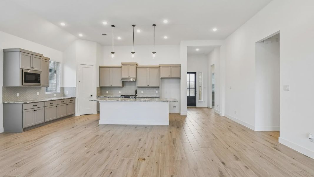 Furnished interior view inside a new home in Artavia, Conroe (Image 5).