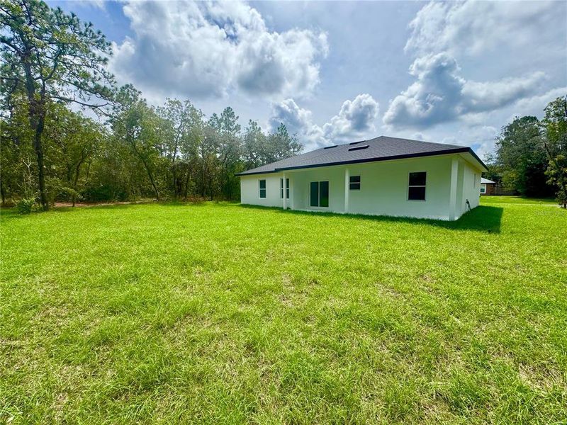 Front exterior of a new home in , Citrus Springs, FL, highlighting curb appeal (Image 18).